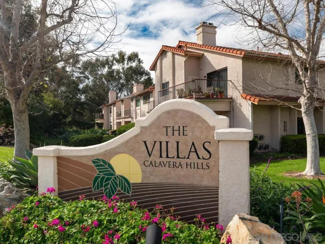 Incredible opportunity to own a RARELY AVAILABLE, SPACIOUS TOP-FLOOR, END UNIT in the highly desirable Villas of Calavera Hills. AMAZING CANYON VIEWS OF NATURAL OPEN SPACE from the primary bedroom, living room and private patio.