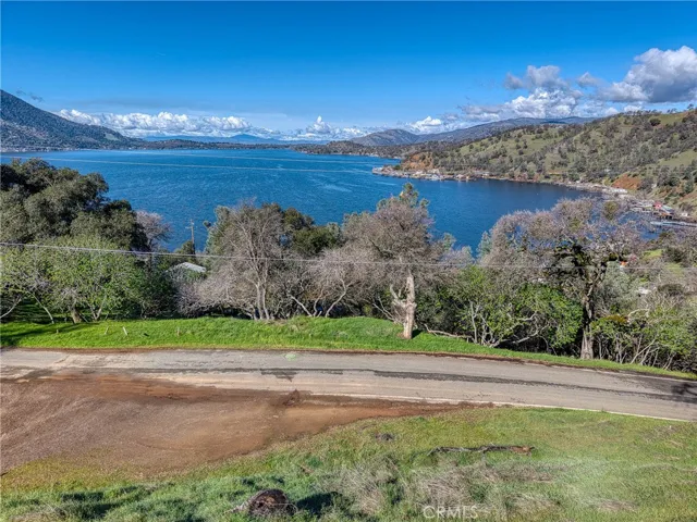 Mountain and Lake views with water, sewer and power at the street.