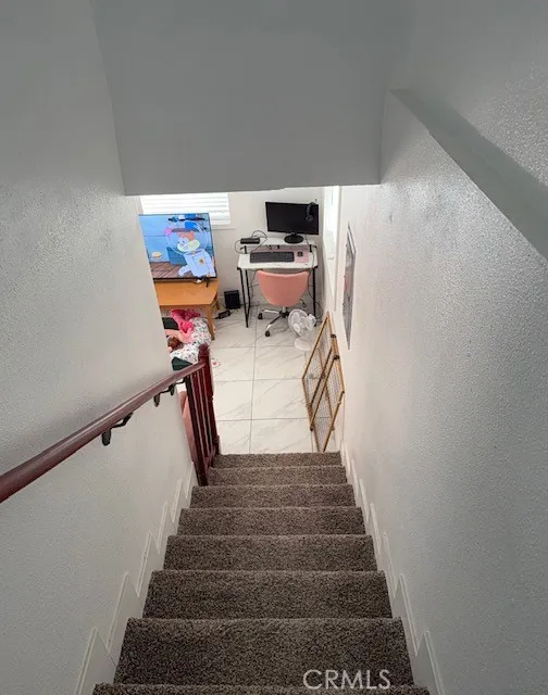 downward view of stairs  from 2nd floor
