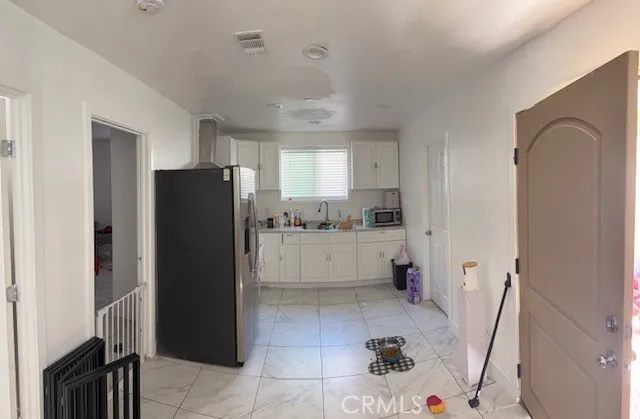 down stairs view  open kitchen