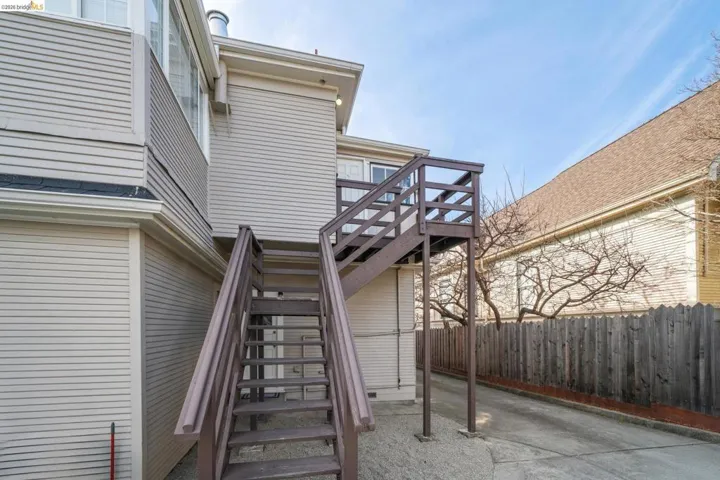 View of exterior entry with a deck
