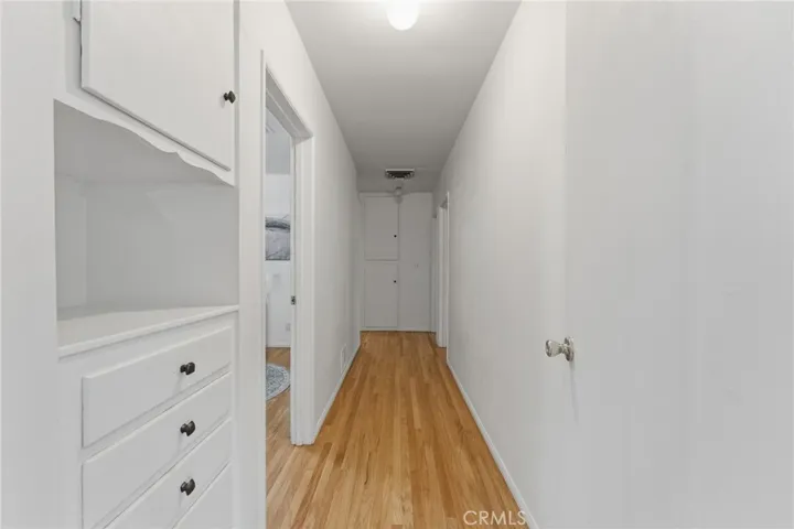 hallway going to the 3 bedrooms