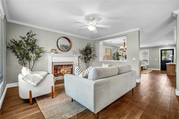 Inviting family room perfect for relaxing or gathering with guests. *Fireplace virtually enhanced