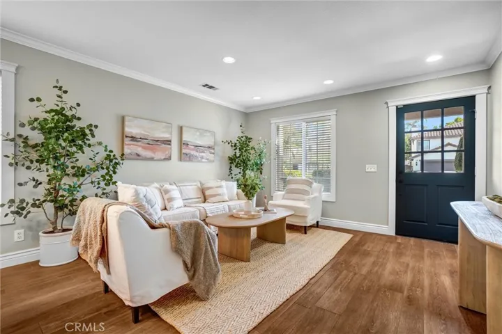 Spacious living area with abundant natural light and seamless connection to the dining space