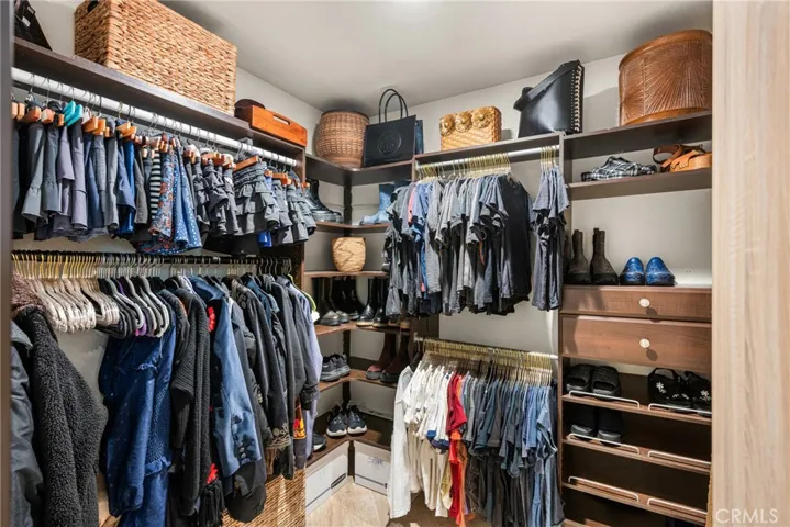 1 of 3 closets in the primary suite