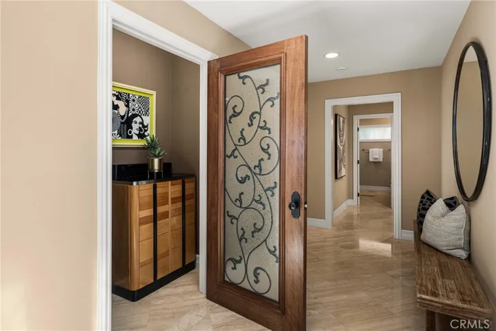 Large hall closet that was previously a wine cellar