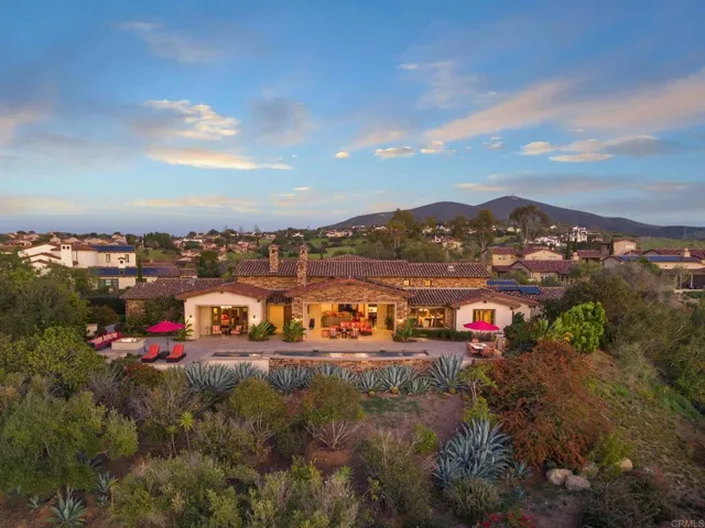 Privately situated at the end of the small cut-de-sac perched up to obtain the ultimate views.