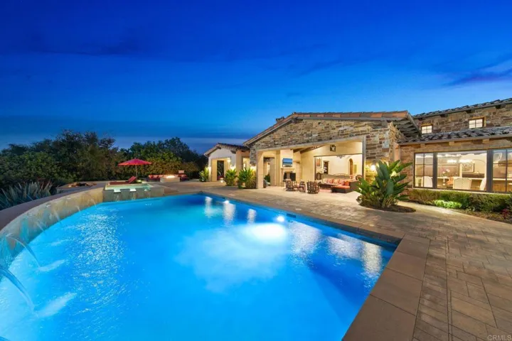 Swimming pool and oversized spa for all to enjoy. Tranquil waterfall sounds soothing the day away.