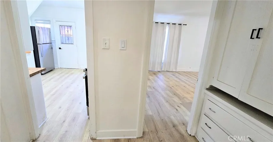 Kitchen on left, living room on the right