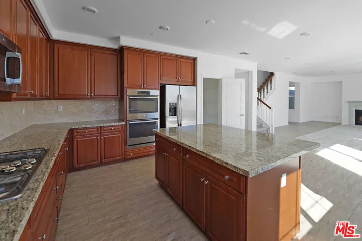 spacious kitchen with big isla