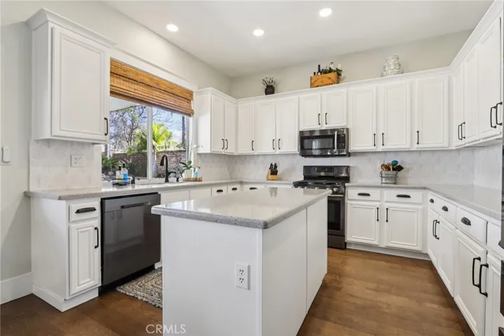 Kitchen island plus plenty of storage and workspace