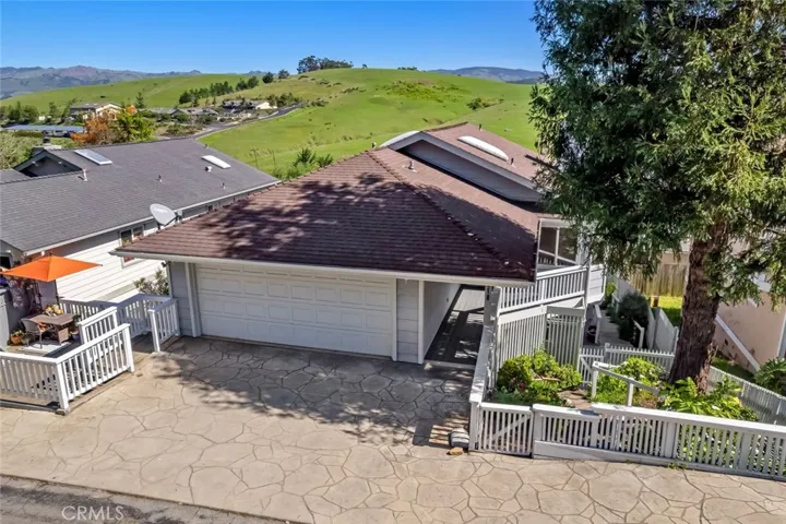 Front of house on McCabe, showing sweeping mountain views off Living Room.