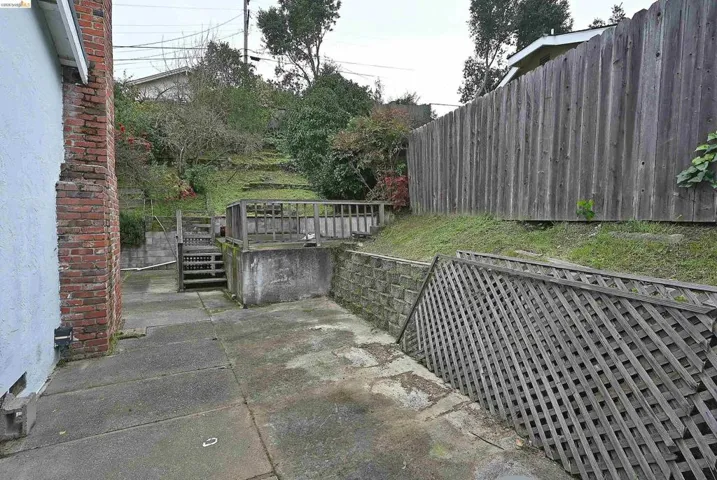 View of patio featuring stairway