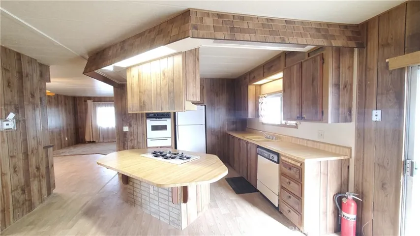 View of kitchen with cook island.