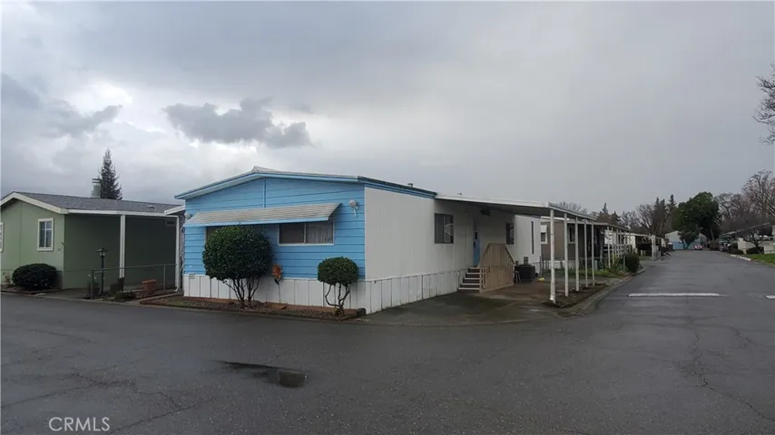 View of front with carport on street side.