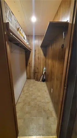 View of large pantry/closet off family room area.