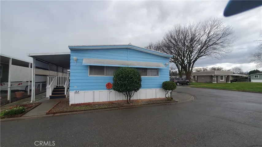 View of front with clubhouse & office across the street.