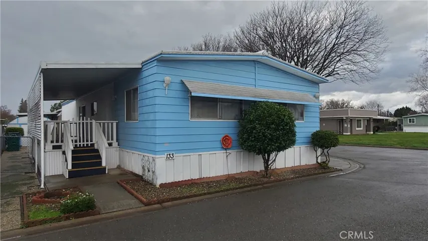 View of front with large covered front porch area.