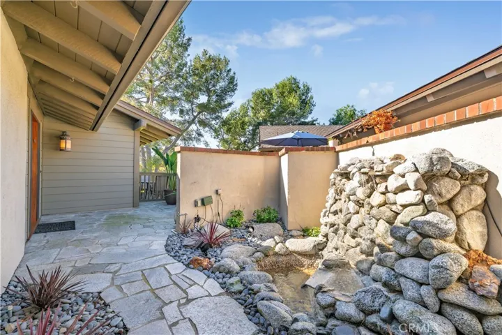 Front Courtyard with fountain & rock waterfall