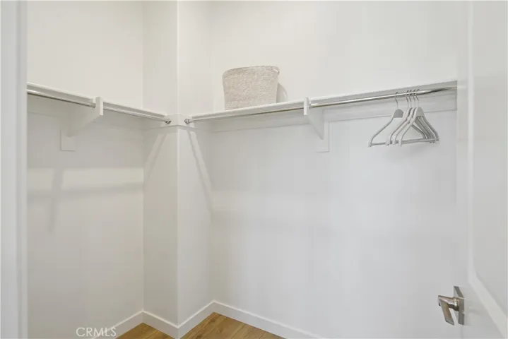 2nd Level Primary Suite Walk-In Closet