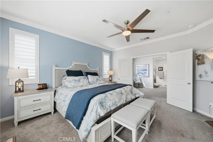 Primary bedroom with double doors.