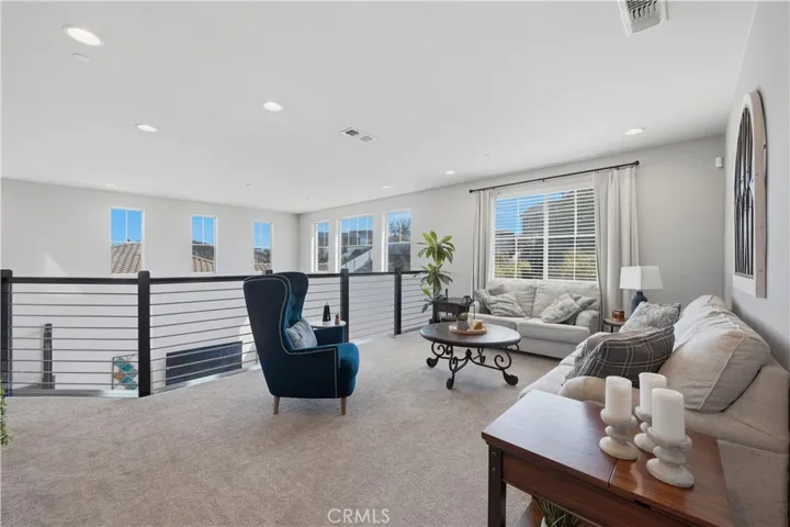 Spacious loft overlooks great room.