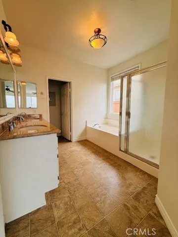 Primary bathroom has seperate shower and tub