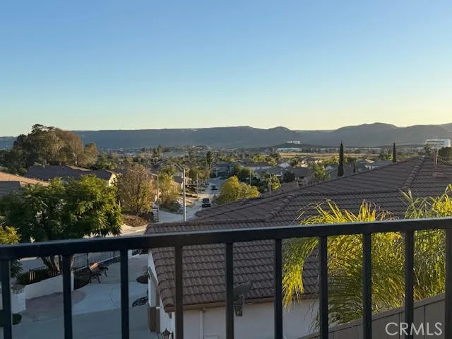 View from backyard shows valley and hills