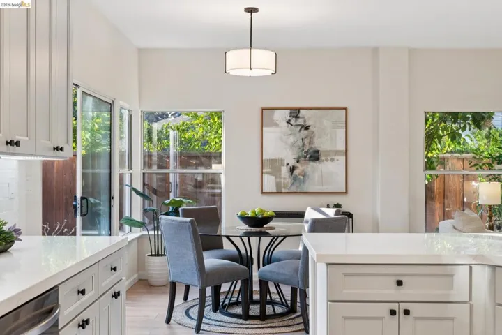 Dining space with light wood-style floors