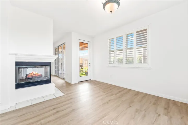 The dining room also features a brand new french door that leads out to your own private patio.  The fireplace has been visually altered.
