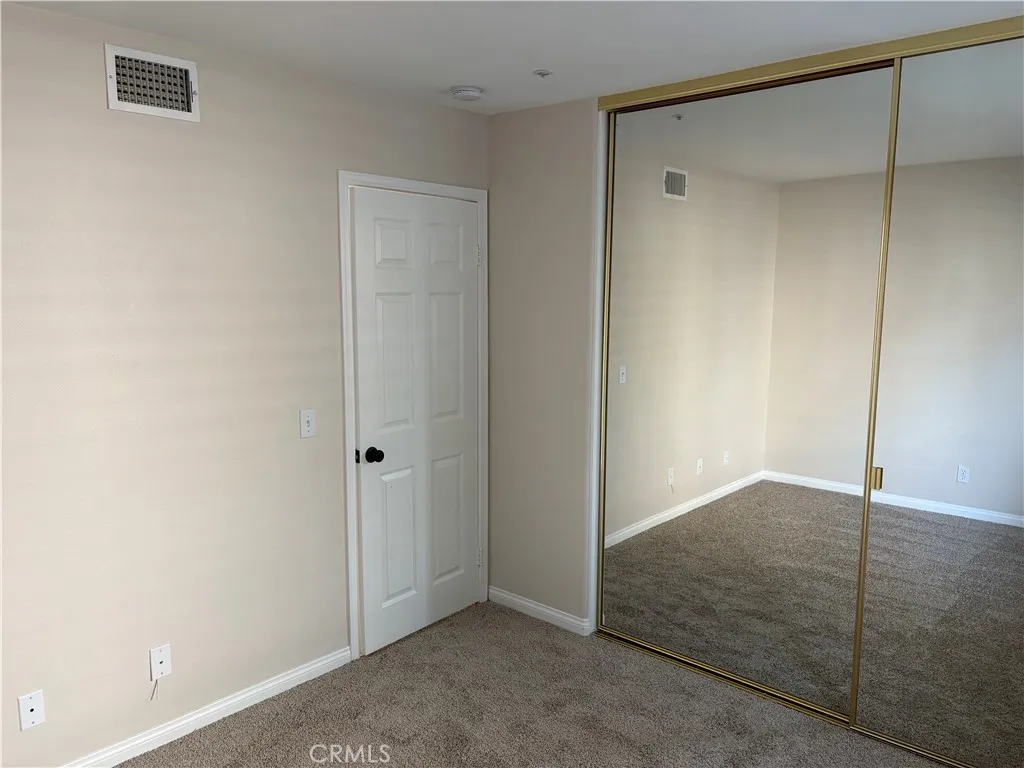 Bedroom 2 Mirrored Closet Doors