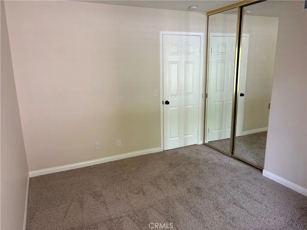 Bedroom 1 Mirrored Closet Doors