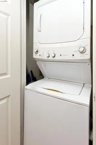 Laundry area with stacked washer / drying machine