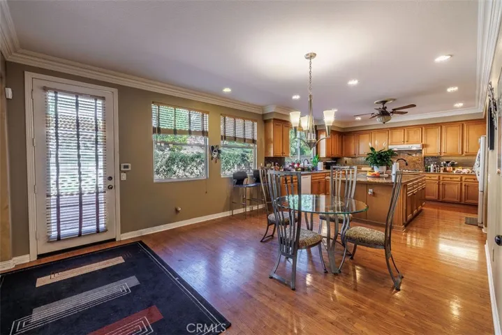 Door on the left leads out to the backyard