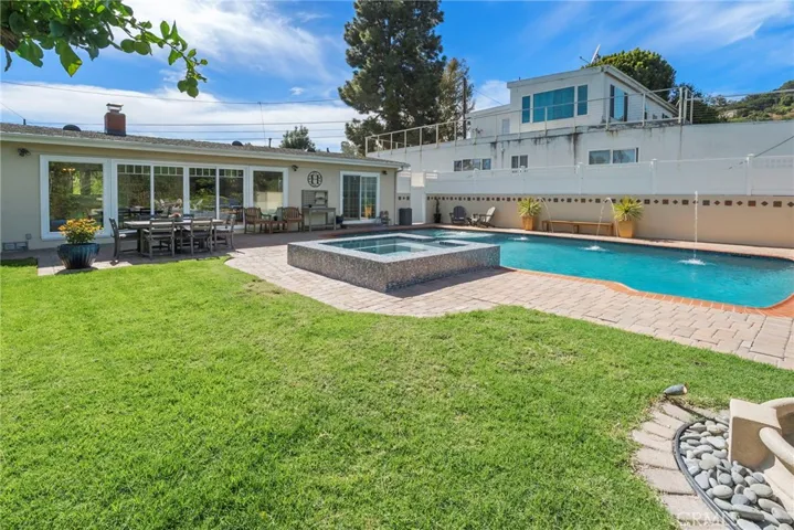 Spacious yard area with fruit trees