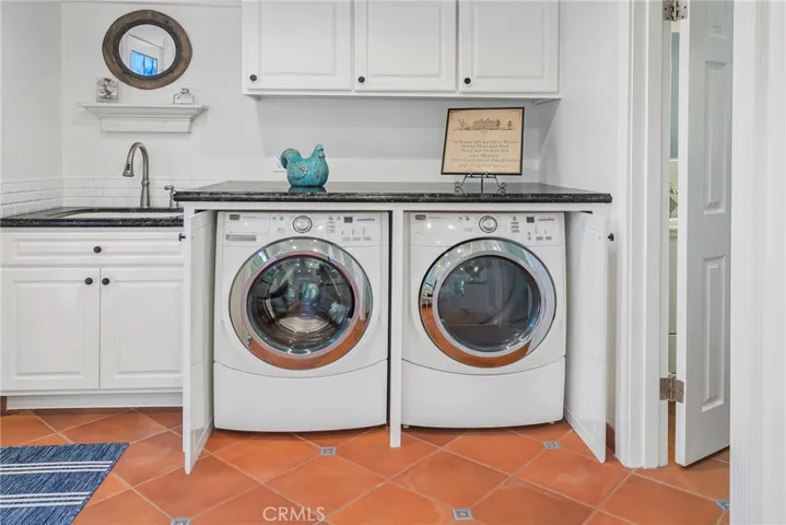 Hidden laundry area, doors slide in for more room