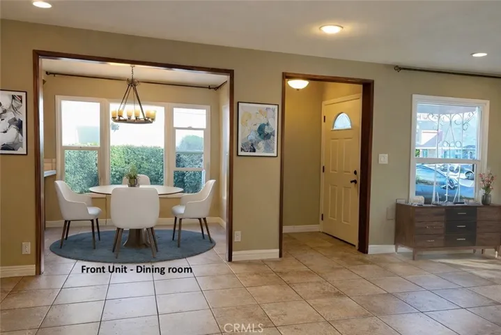 Front Unit - Dining room with Virtual Staging