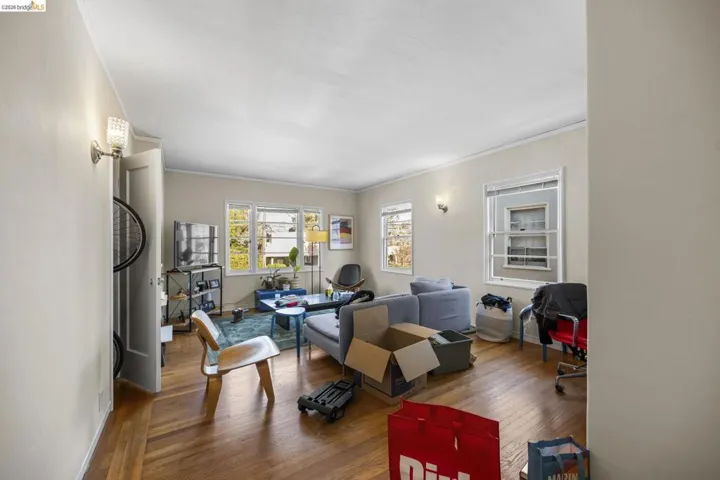 Office featuring ornamental molding and hardwood / wood-style flooring