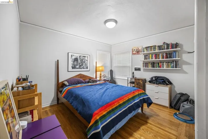 Bedroom with wood finished floors