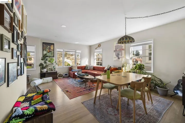Dining space featuring wood finished floors and recessed lighting
