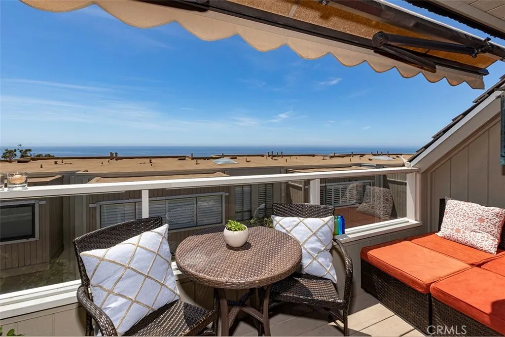 A view of the deck off the living room, with an expandable awning.