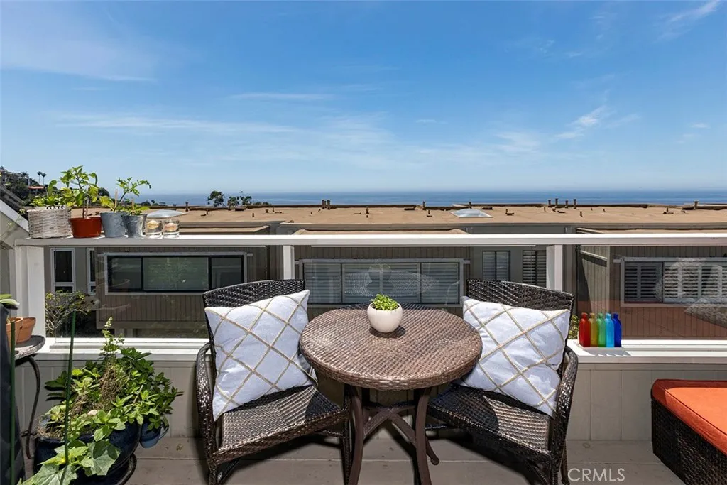 Sunny south-west facing deck off the living room, with great ocean views.