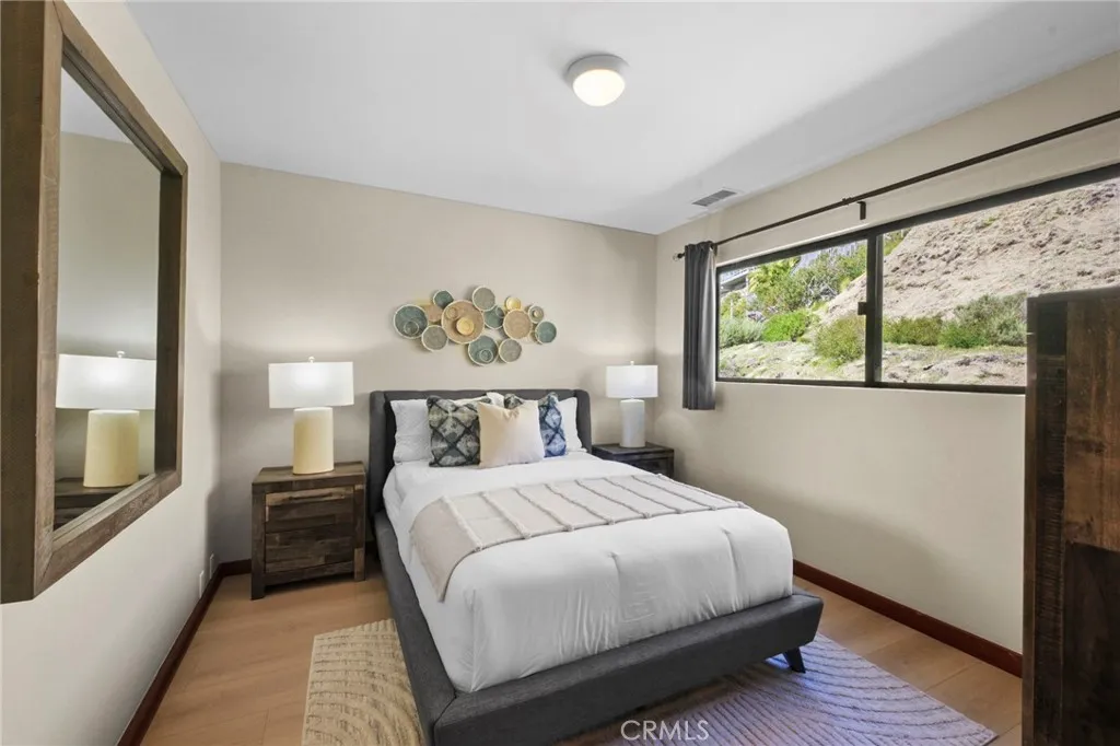 This room was added during the remodel, located on the top floor, with a full bath located just outside the bedroom door.