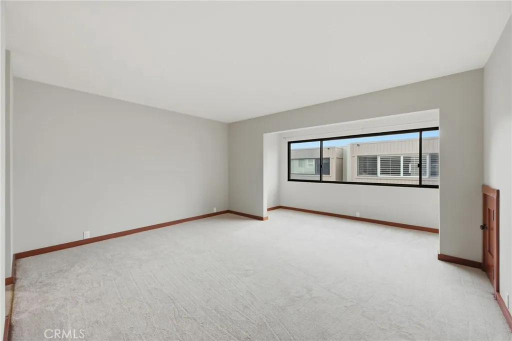 This is a current photo of the primary suite which has brand new carpeting!