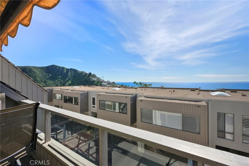 Another view of the exterior deck and the ocean views beyond.