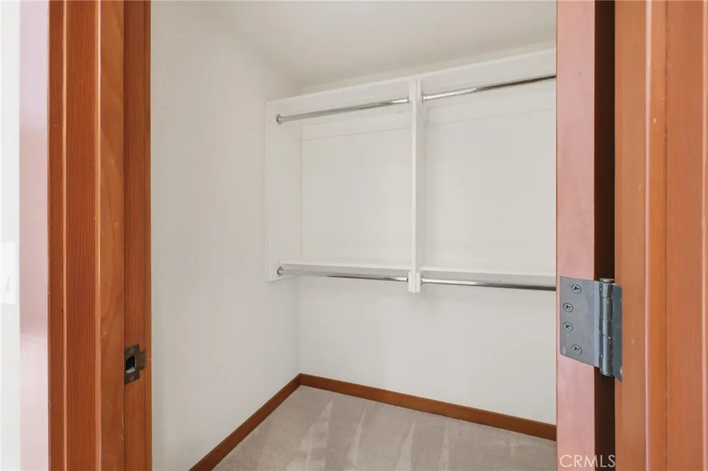 The walk-in closet in the primary suite.