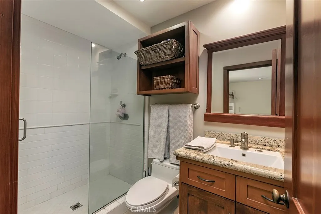 2nd bath inside the 2nd bedroom, with a walk-in shower.