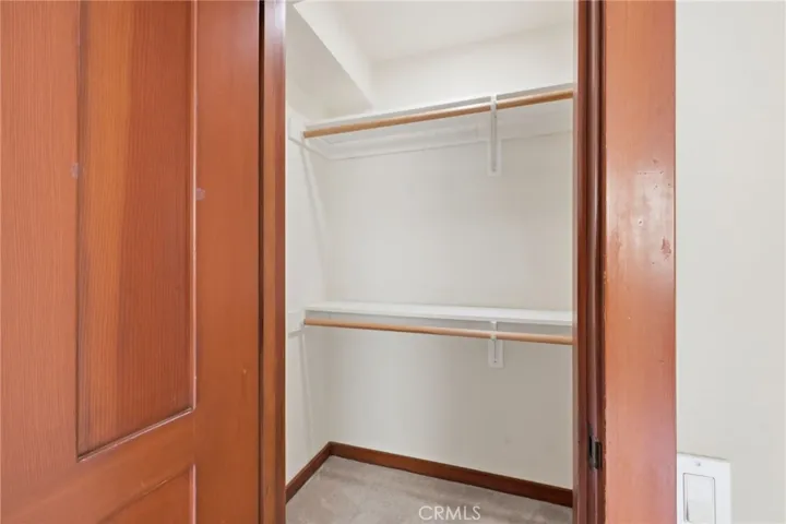 The walk-in closet in the 2nd bedroom.