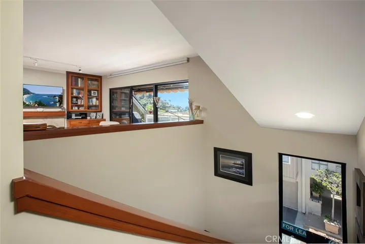 Staircase leading up to the 3rd-main floor.