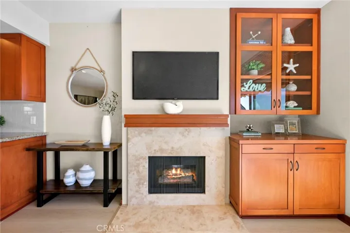 Newer gas fireplace & newer built-in cabinets.